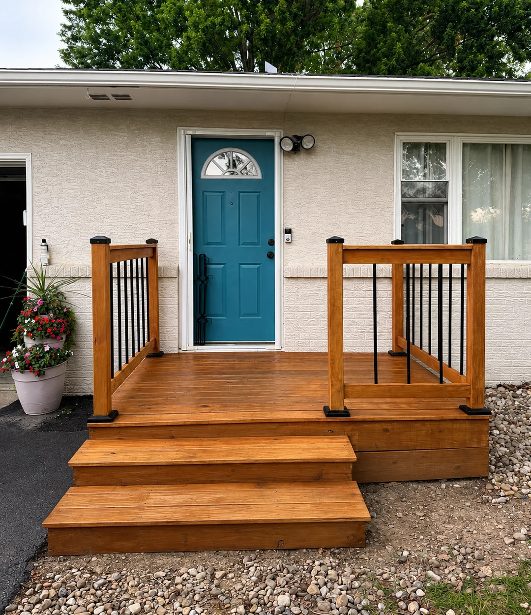 Finished deck with stained wood railings
